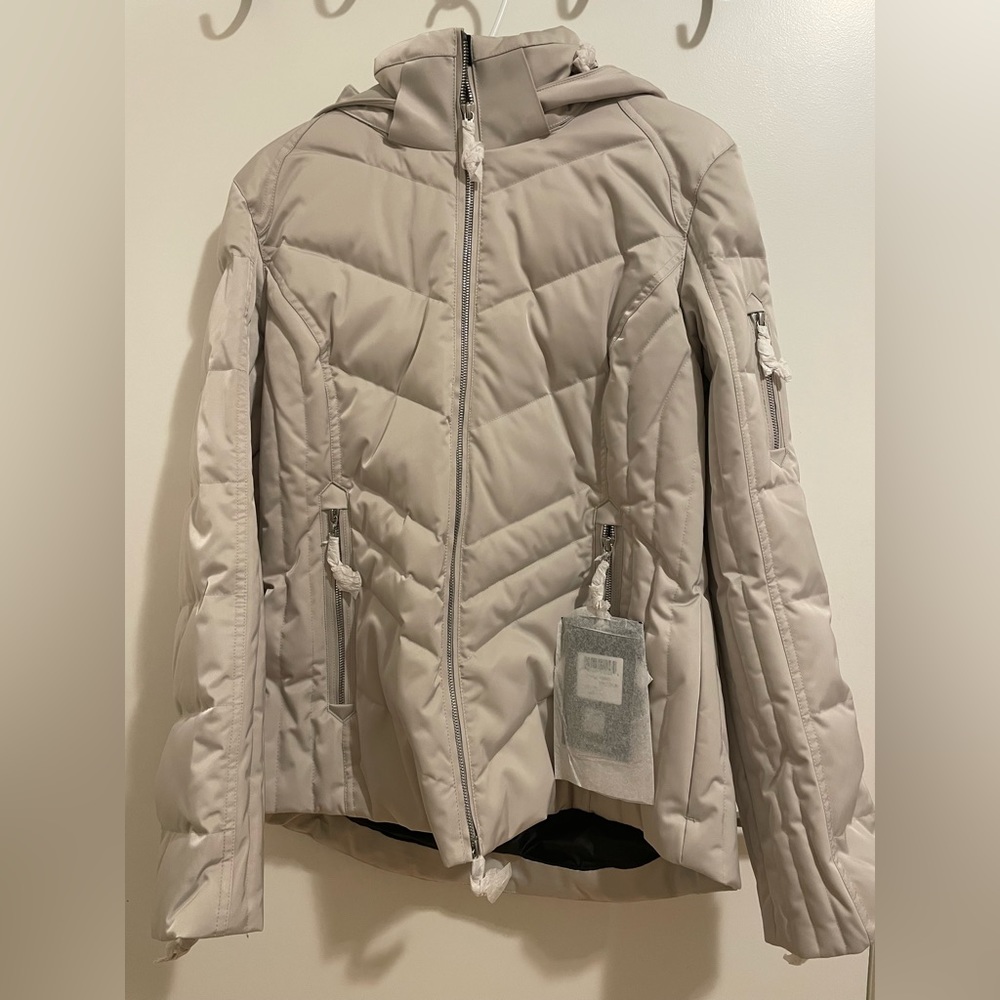 Beautiful NWT ladies Karbon Spectrum ski jacket, size 12, Champagne colour.